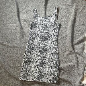 Divided Black and White Snakeskin Mini Dress